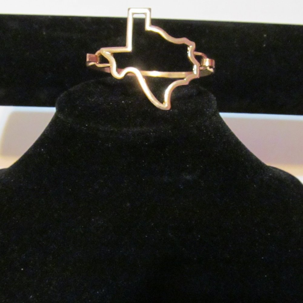 Gold tone state of Texas bracelet